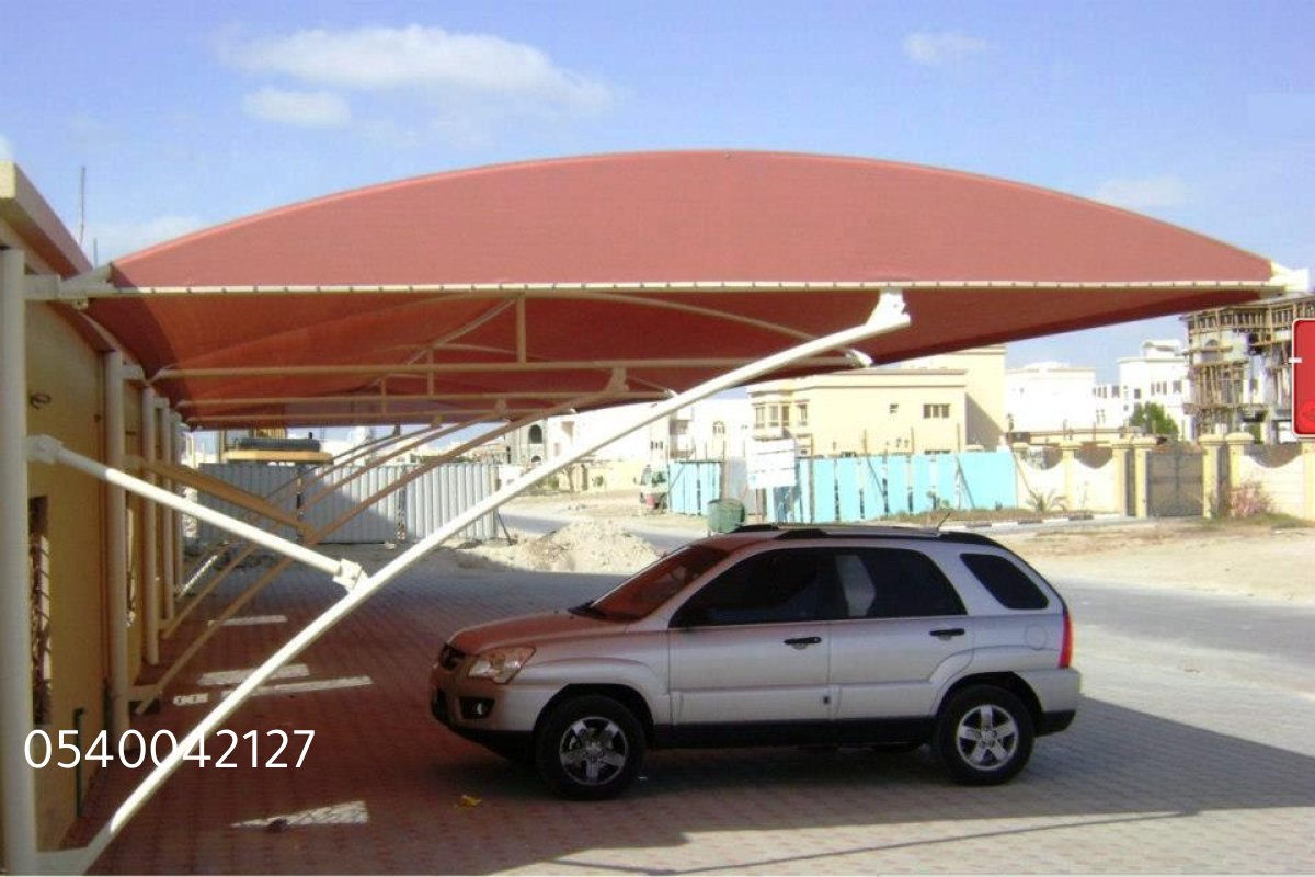تكنولوجيا حديثة في تصنيع مظلات السيارات لضمان الدوام.